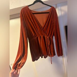 Felt burnt orange long sleeve top. Fall style and a synched waist